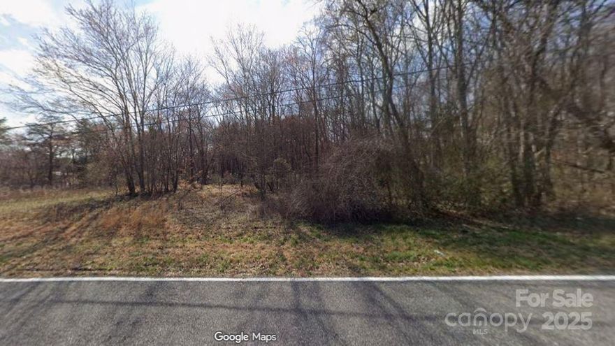 Great property ready to be cleared for construction. 328' road frontage on Ashwood Street and 388 road frontage on Happy Trail. 3 miles to downtown Maiden.