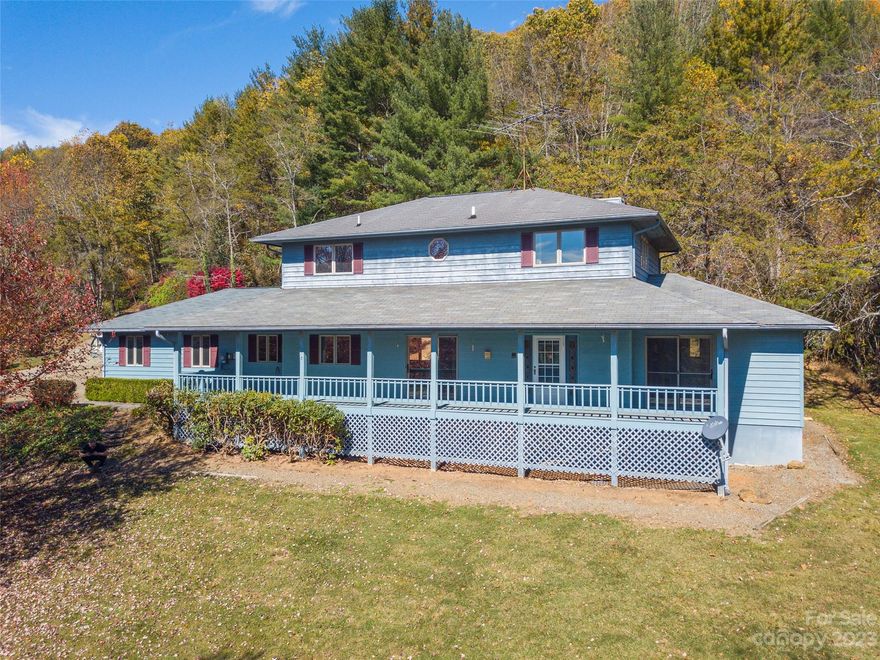 Immerse yourself in the tranquility of mountain living in the Crabtree community, situated on 1.4 acres of pure serenity. This well-maintained traditional home, nestled in peaceful surroundings, offers a canvas to infuse with your unique style. The spacious home boasts solid foundations and room for customization. Relish the ample space for gardening, recreation, and four legged friends. Step onto the covered front porch and soak in the breathtaking mountain vistas. Tree trimming will allow for more captivating ridgeline views. The living room is the heart of the home, featuring a timeless stone fireplace that exudes warmth & coziness. The eat-in kitchen welcomes your updates and finishes, making a space that suits your tastes. Enjoy the primary suite on the main level and two additional bedrooms plus a bonus room upstairs, offering flexibility to cater to your needs. Furthermore, the assurance of a new roof installation by Baulken Roof scheduled in November 2023.