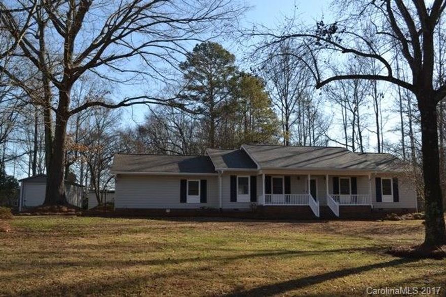 Beautiful home with tons of updating! This one will not last long! Beautiful granite kitchen with new stainless appliances, work island, breakfast bar. Great room has fireplace/gas logs, pretty updated baths!  Your favorite room in the house may very well be the sun room! Fenced back yard, attached double garage, three storage buildings of which two are wired! This home sits on almost an acre lot, has a brand new roof, new carpet, freshly painted. Great location with easy access to schools!