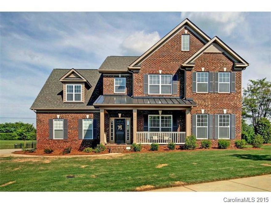 Enjoy this full brick home in pristine condition. Level back yard, fenced, large patio, well landscaped and maintained. Open floor plan with lots of natural light. Master on main, two story great room. Handscraped hardwoods in mint condition. Kitchen with granite and tile back splash. Center island, large kitchen pantry and butlers pantry. Wrought iron balusters. Three bedroom up and a large bonus room.  Move right in!