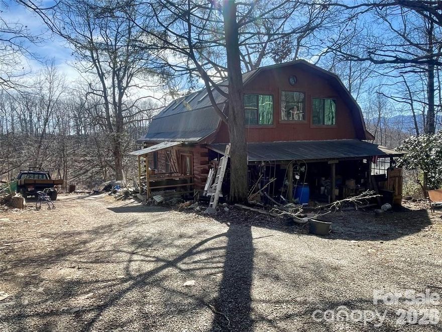 I'm Searching for the visionaries, investors who think outside of the box! Are You Looking for an investment opportunity? Airbnb? Long term rental or perhaps your own primary/secondary home in the country with seasonal views of Black Mountain? Well, consider checking out this log home located at 705 Doc Howell Rd, Spruce Pine, NC! This 2 bedroom, 2 full bathroom and one-half bath log home offers 2,000 + sq feet, plus a basement area & sits on over 4 acres of land. This property has so much potential! Property also conveys an outdoor building which is wired. Sellers are Motivated and they are Welcoming All Offers. They say Location is everything and you cannot beat this~ Within minutes to the beautiful Blue Ridge Parkway, mountain hiking trails, trout fishing and fine dining. And just a short drive to Asheville, Boone, Blowing Rock & Johnson City, TN where you can enjoy more amazing hiking trails, golf courses & ski resorts~ all close by! One Owner has never occupied property, so information is limited. See property disclosures attached.