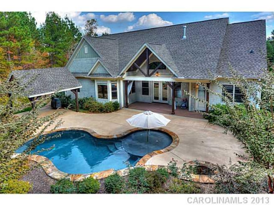 **SELLER WILL ENTERTAIN OFFERS BETWEEN $478,000 AND $495,000** Custom home with upscale upgrades and backyard oasis:Hardwood floors, stone fireplace, SS appliances, Granite Countertops, Firepit, Inground Pool with stone surround, Cabana, Fenced Yard, Covered Patio, Beams in Ceilings, Media Rm w/Surround Sound, Retractable Screens for Patio, Extensive Crown Molding, Double Door Entry, Plantation Shutters, Glazed Cabinetry. Contact Agent for Full Features List.