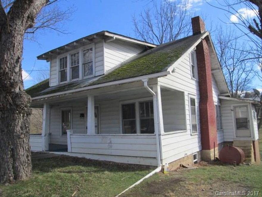 Lots of potential with this 1930's style home with 3BD/2BA on .15 acre lot. . Main has living room, kitchen, mud room, laundry room, bedroom and full bath. Upper level has 2 bedrooms, bathroom and flex room/office/playroom. Basement is unfinished. Covered front porch and back patio off the basement.