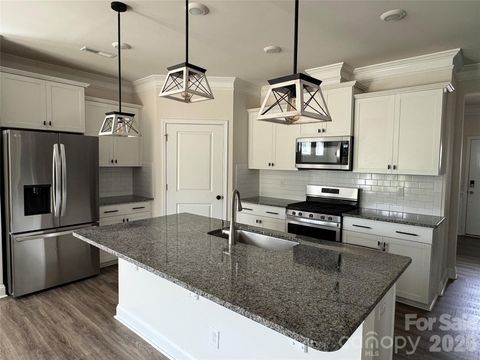 Photo of 340 Secretariat Drive, Iron Station, NC 28080 (MLS # 4369123)