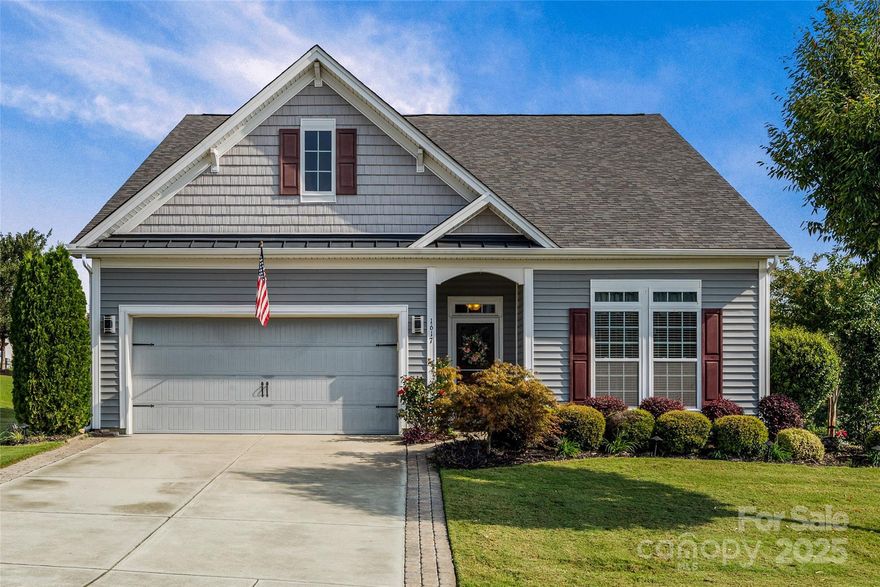 This spacious 4-bedroom, 3-bath home offers an incredible open floor plan and sits on one of the largest lots in the neighborhood! The main level features 3 bedrooms and 2 full bathrooms, including a primary suite retreat with an oversized shower and a large walk-in closet. You’ll love the chef’s kitchen, featuring an enormous island, double ovens, two pantries, stainless steel appliances, and ample space for entertaining. It's open to the spacious great room, complete with a built-in bookshelf and gas fireplace. Upstairs, discover a versatile bonus area, along with an additional bedroom and full bathroom—perfect for guests, a home office, or media space. Step outside to enjoy the private,  covered pergola and patio, designed for relaxing evenings or weekend gatherings. With its large lot and modern layout, this home truly has it all—style, space, and comfort in desirable Clover, SC!