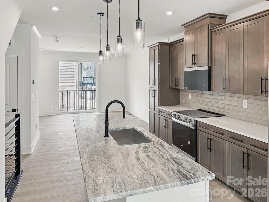 Located in the Heart of Lower Southend. Within walking distance to all the hot spots. Chambray at Loso has 4 story townhomes with rooftop terraces and 2 car garages. Perfect floorplans with your city living lifestyle in mind. Our Dunbrook floorplan is perfect for a roommate living situation with 3 Bedrooms and 3.5 baths. A full bathroom inside every bedroom. Why rent when you can own. Ask us about our finance incentives. Call to schedule a tour or just stop by any time.