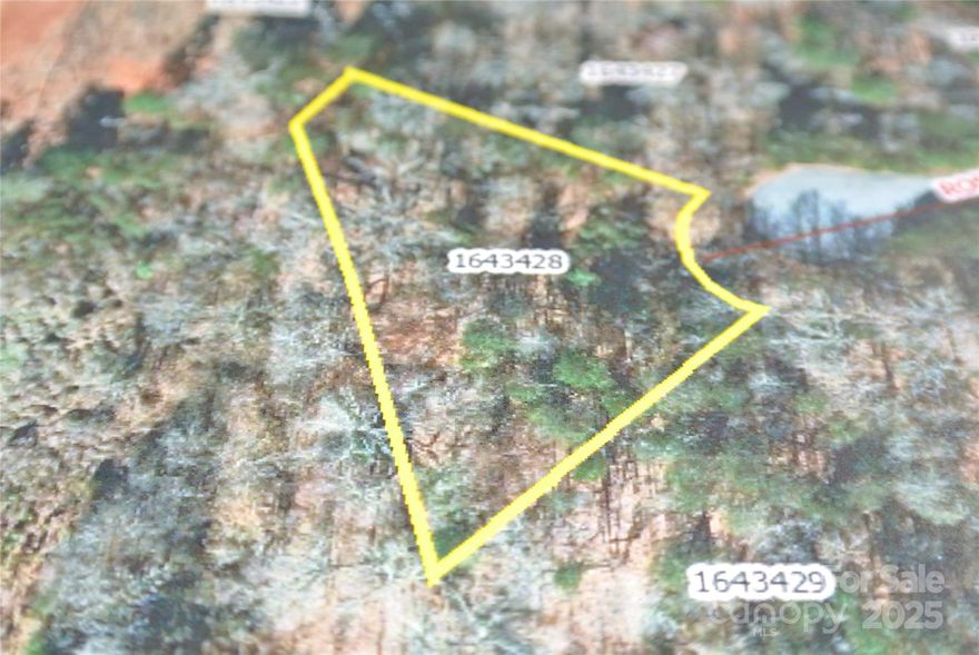 Enjoy privacy in cul-de-sac outside city limits.  Conveniently located near shopping, schools, walking trails, Tryon International Equestrian Resort and golfing.   Very close to downtown Rutherfordton with variety of restaurants, unique shops and museum.  Purchase any 2nd lot with accepted offer by 12/31/2025 and receive 50% discount on 2nd lot.