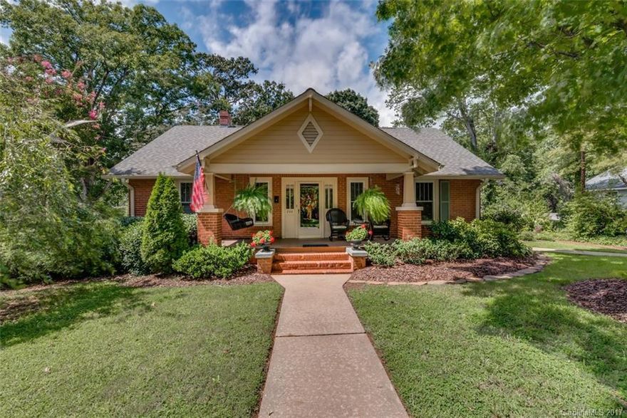 Charming Craftsman-Bungalow located on a Fantastic street a short walk to downtown Spindale. All of the original character still shines, including hardwoods, large moldings, bead-board ceilings, lots of windows with natural light, deep front porch & yet offers modern updates to the baths & decor throughout that make it a show-place! 3 Beds (1 used as den) & 2 Baths + Formal Dining & Breakfast Nook off Kitchen! Detached Enclosed Carport, Playhouse, Great Porches & Rear Deck + Cellar Basement!