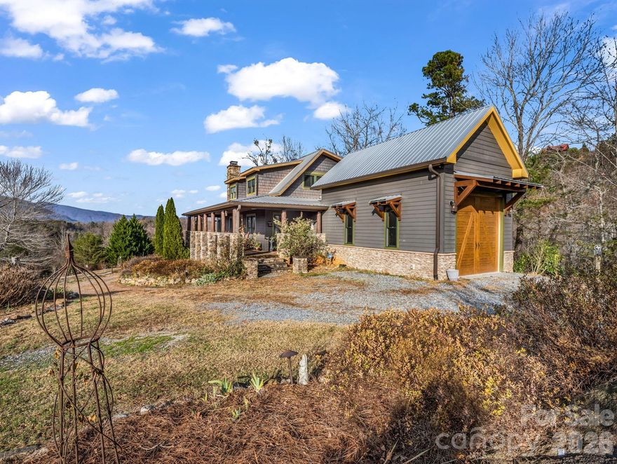 Morning coffee with the mountains, dinner at sunset, curled up among the trees with a book, or scrolling social media on the deck pretending to be productive—your call! No judgement! :)
Sitting amazingly perfect on 4.28± ACRES!

Welcome to 301 Peaks Drive—beautifully crafted, MOVE-IN READY mountain cabin perched in The Peaks of Lake Lure, one of the area’s most sought-after gated communities with it's ease of access and killer views!!! Known for its serenity, paved roads, gentle access (no steep mountain climbs here!), and long-range Blue Ridge VIEWS, this is a top pick for anyone wanting the perfect blend of privacy, beauty, and convenience. 

AMAZING MOUNTAIN VIEWS - This home makes you stop and say, “Wow,” each time you walk through the door as sunlight pours in the windows and an inviting floor plan with vaulted ceilings, warm wood accents, and expansive windows framing those year-round ridgelines like moving artwork! The cozy stone fireplace centers the living room, while the kitchen and dining flow right out to the expansive deck, also! Comes with 2 - one car garages - 1 for each "living area" - car enthusiasts or for a second living quarters, it can be offered or finished out... your choice!! 

Another huge perk - The separate 2nd living quarters, complete with its own private entrance and its own garage/parking area. Perfect for guests, multigenerational living, or an income-producing rental, this setup offers incredible flexibility. It has its own easy pull-up access. (***Previously rented out prior to these owners)

Outside, enjoy wooded privacy, room to explore, and a quiet yet babbling creek at times along the lower property line. You might never make it down that far, though—because the front porch and decks offer such extraordinary, peaceful vistas that you’ll feel completely wrapped in the mountain backdrop, soaking in unobstructed views. Come see for yourself! 
(*Appointment required—gated community; must be accompanied by an agent.)

Whether you're searching for a full-time home, a mountain getaway, or a smart investment, 301 Peaks Drive delivers unbeatable Mountain Views, natural light, thoughtful design/layout + 2nd Living Quarters, and one of the best locations Lake Lure has to offer - for your quick access or private seclusion! See what the fuss is all about! 

Also, surrounded by Western North Carolina’s incredible outdoor recreation, you’re just moments from Chimney Rock State Park, Lake Lure, and year-round adventures if you decide to venture out! Travel is easy too, when you come in or have family/friends visiting —about 1 hour to AVL and GSP airports, and roughly 1.5–2 hours to the Charlotte area (CLT International) Homes here don't last long, and thanks to the combo of quiet living, gorgeous scenery, and being only minutes to shopping, dining, and Lake Lure’s best attractions, along with all this home offers...