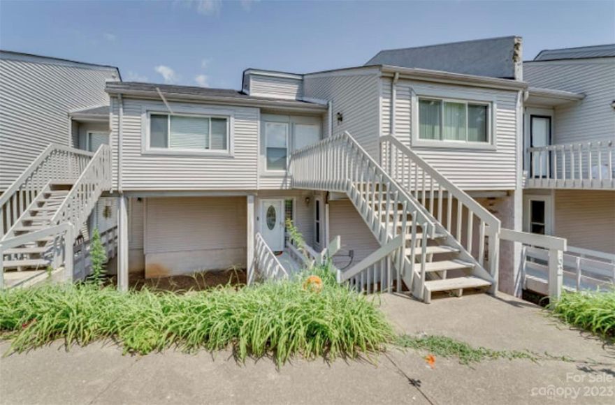 LAKE LIVING from a condo! Delight in gorgeous LAKE VIEWS from nearly every vantage point in your new home. Take leisure at the community-maintained amenities with a swimming pool, clubhouse, tennis court, and EVEN A DOCK!  This unit is one of the largest in the complex. Water, sewer, and trash are included, along with the safety of security lighting. Each of your cozy bedrooms also come with views. The kitchen boasts lovely and warm maple cabinets. Whether you're coming home from a long, hard day, or working from home, enjoy the tranquil natural setting off your PRIVATE BALCONY. At LAKE HICKORY CONDOS, you are in the center of it all, close to restaurants, shopping, hiking trails, and parks. Also, just minutes from ASU and Lenoir Rhyne University.  This unit is currently a successful and operational Airbnb/Short Term Rental until early February in order to start showings.