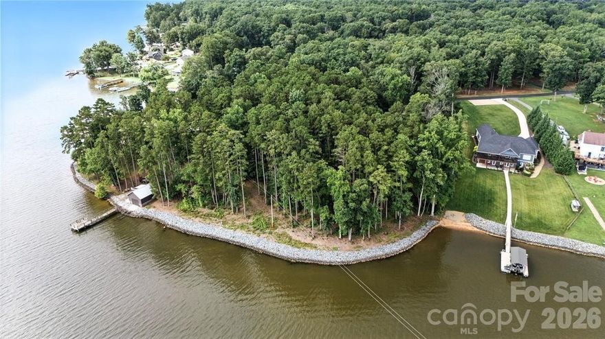 GORGEOUS LONG RANGE WATERFRONT VIEWS from this 2.05 ACRE LOT!  Riprap installed!  Gently sloping waterfront lot located in the small PRIVATE Sailor's Rest Community!  4 BEDROOM PERMIT ON FILE as well as DOCK ELIGIBILITY with Cube Hydro! Build your DREAM HOME today! Per the Restrictive Covenants, only homes built "on-site" shall be allowed to be used as a residence, provided however, rare exceptions depending on the style and character of the structure may be approved by the Committee after written application.