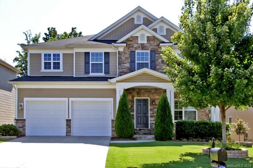 Immaculate home in great community w/ amenities! Beautiful curb appeal w/ stone accents, rocking chair front porch & pristine yard! Nice open floor plan w/ large kitchen featuring granite counters, tons of cabinets & tile. Great room features gas fire place & wood floors! Spacious bedrooms & master w/ large shower & garden tub! Great equity potential w/ 1230 sqft of unfin basement & is plumbed for a bathroom! You'll love the patio & fire pit in fenced in backyard overlooking the woods! Must See!