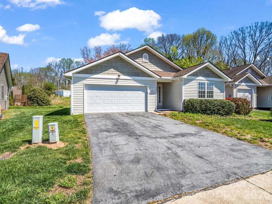 Welcome home to Bedford Place, one of Brevard’s most sought-after communities, where single-level living meets mountain charm and everyday convenience. Set against the backdrop of the Blue Ridge Mountains, this beautifully maintained 3-bedroom, 2-bath home offers the perfect blend of comfort and function in a tranquil neighborhood that feels tucked away, yet is only minutes from downtown Brevard’s restaurants, and shops, and the beauty of Pisgah National Forest.

Step inside and immediately notice the fresh, airy feel — the entire interior, including trim and doors, was professionally repainted in March 2026. New carpet graces the bedrooms, complementing the home’s open layout and vaulted ceilings. A thoughtful split-bedroom design ensures privacy, with a generously sized primary suite featuring a spacious walk-in closet and bright en-suite bath.

At the heart of the home, the kitchen shines with modern appliances and abundant workspace — a true cook’s dream. Its light-filled atmosphere invites casual breakfasts, meal prepping, and relaxed gatherings with friends. From the kitchen and living spaces, natural light pours in, enhancing the warmth and flow of this well-planned layout.

Practical details add to the ease of living here: a two-car main-level garage provides smooth entry (two small steps). Whether you’re hiking scenic trails, exploring local art galleries, or savoring mountain sunsets while walking in the neighborhood, this home offers a comfortable and connected lifestyle.

Built in 2002 and lovingly maintained, this residence stands ready for its next chapter. The pre-listing inspection is complete and available for review, offering peace of mind to buyers. All major kitchen appliances, washer and dryer, and window blinds (for most windows) convey, making your move-in seamless.

Experience the best of Brevard living — scenic beauty, modern comfort, and effortless convenience — in this inviting Bedford Place home. Your mountain retreat awaits.