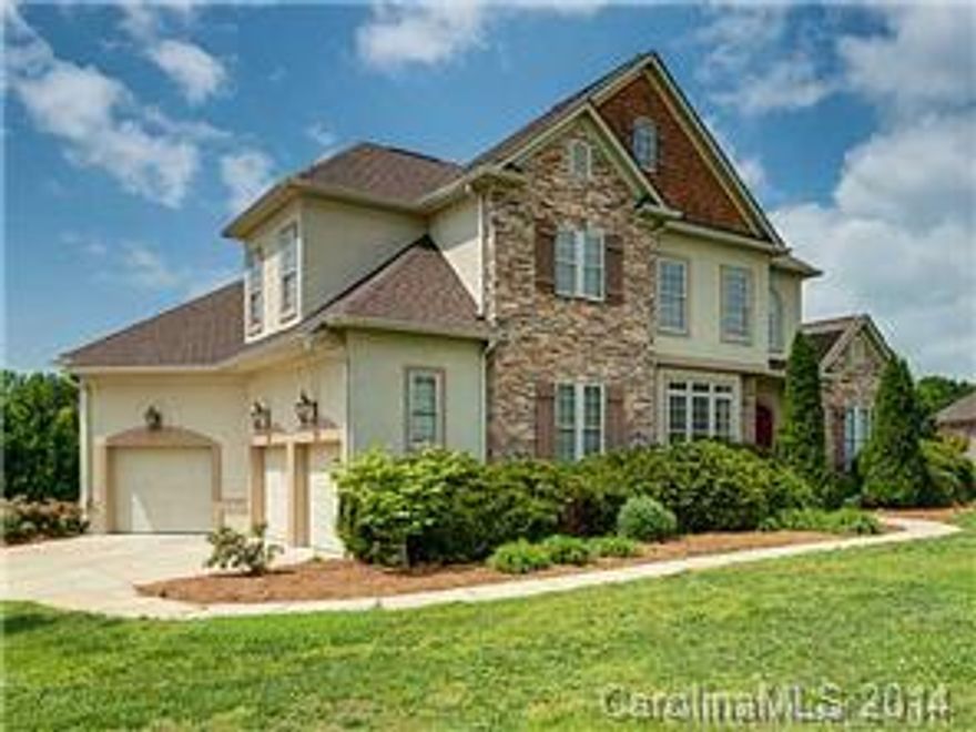 Stunning stone and hard stucco facade home on over an acre!  Waterfront and water-view on a lake/pond. 3 car side load garage.  Master bedroom is on the main level.  Large bonus room with built in desk. Exceptional condition.  Lease terms are negotiable.