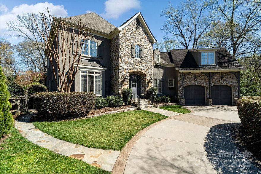 Tucked away in Southpark on a quiet cul de sac, sits this Charming English custom built cottage-style home on a half acre. The stunning pool, expansive tiered patio and lush lawn are surrounded by privacy landscaping. On the far side of home, is a secret terraced garden—a true delight for gardners. Step inside to a perfectly designed floor plan, featuring a main level primary suite with large walk in custom closet and direct patio access. A private office provides a quiet workspace. Chef's kitchen w/ Sub Zero & Viking appliances, opens to breakfast & family room that boasts stunning views of the pool. Spacious laundry room with sink, custom cabinetry, fridge and drop zone. Upstairs, you’ll find three spacious bedrooms, a loft, and a bonus room, offering flexibility for any lifestyle. Located just minutes from SouthPark's premier dining, shopping, and business district, this home is the ultimate blend of style and comfort. Don’t miss this peaceful resort retreat in the heart of it all!