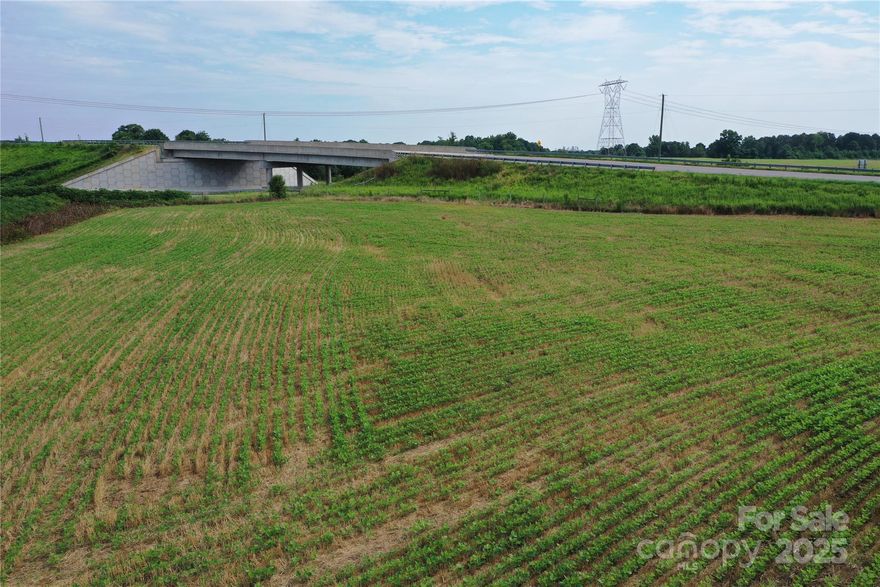 Price Reduced!  New Shelby Bypass is OPEN from Hwy 74 West to Hwy 150.  Ideally located between Highway 74 and the new Shelby bypass, this property boasts prime access and visibility for travelers between Charlotte and Asheville. Currently used for agriculture, with both tillable and timber land, it holds tremendous commercial potential. The property features a natural spring, creeks, and a +/- 1-acre pond. County water is available on Westlee Street, and electricity is close by. The seller is open to subdividing, offering the option to split the land into two smaller parcels divided by the bypass. See MLS number 4121230 (21+- acres) and MLS Number 4121232 (20+- acres).  Final acreage will be confirmed by a survey.
