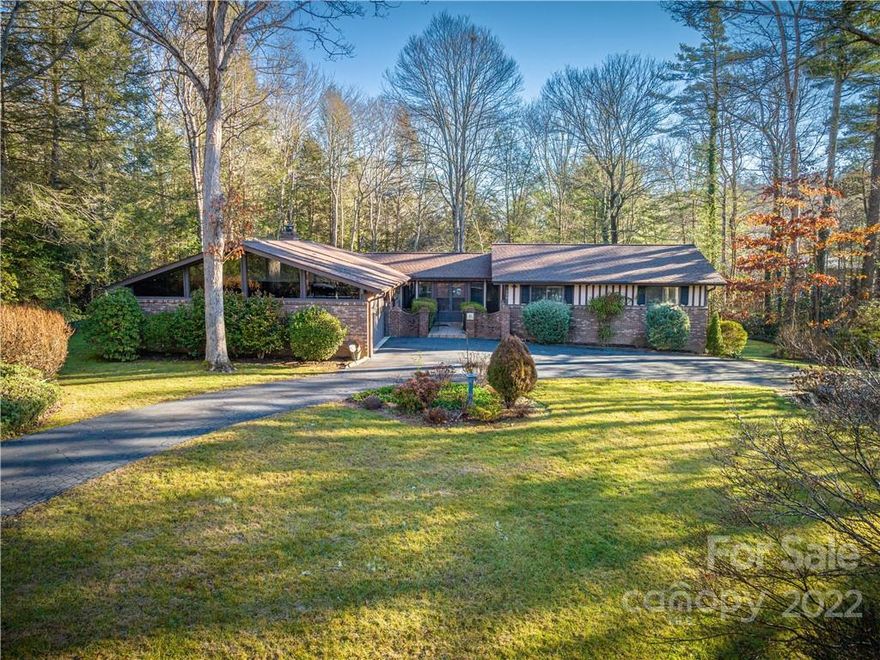 Walk Through A Delightful Private Courtyard Entry To This Highly Desirable Crooked Creek Updated 3BR/3.5 BA Ranch-Style Home, Sited On 0.69 Lot With Fenced Area In Back. Newer; Roof, Gutters, HVAC, Wood Flooring, Deck Expansion - Trex, Paint, Garage Door Opener| Springs, Porch Door Replacements, Shower Door - Master, Tile Flooring, And Water Heater, Soffit And Fascia Repair/Replacement. Wall Removals To Obtain A More Open Look In Living Room. Newer Washer And Dryer Convey. Heated (But Not Countable Space In Basement) Workshop Area, Garage Door, And Heated Area For Expansion | Game | Craft Room Plus A Full Bathroom. Terrific Enclosed Porch, Semi-Circular Paved Driveway, Level Front And Lower Yards.  Crooked Creek Is Just 2.6 Miles From Downtown Hendersonville, And Offers: Single Entry From Kanuga Road, Gently Winding Roads, 24 Hour Surveillance, 10 Acre-Pond, 5-Acre Park, And Yes, Fishing Is Allowed. The Golf Course Does Not Require Mandatory Membership Fees.