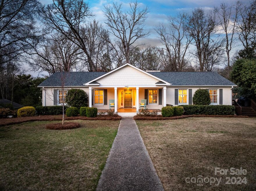 A gem in highly sought after Sherwood Forest that delights at first glance of the large columned rocking chair front porch. Once inside, you'll be further impressed with the open floor plan that leads to a den full of natural light with wood burning fireplace adjacent to the updated kitchen with granite countertops, a large island, double wall ovens and a gas cook top. From here, access the upper deck with ample space for seating and grilling. The primary bedroom includes two closets, as well as an en suite bath with double sinks and a travertine floor.
Fully finished basement features cozy den, guestroom, remodeled full bath, large workout/game room/playroom and a large laundry room with adjacent storage closet. Enjoy the screened porch which is perfect for entertaining, sipping coffee or simply listening to the songbirds sing and overlook the private yard with mature hardwoods. This home is complete with a rare, 2 car oversized garage with ample storage. *Relocation. No DD Fee.