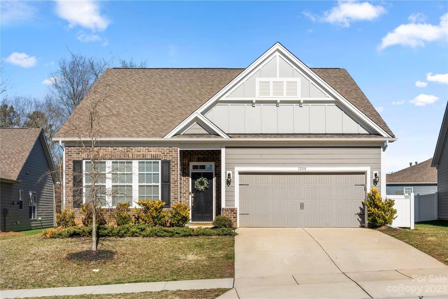 Come see this beautifully maintained home.  It offers a great floor plan, spacious and open.  You will see ample windows and an open floor plan that captures plenty of natural light.  The main level features the Primary bedroom with a Primary bath and walk-in closet.  There are two other bedrooms on the main.  You will also find a spacious great room and gourmet kitchen with long countertops for lots of prep space. You have a sizable breakfast area and a large dining area fit for entertaining.  This home is appointed with wood floors, upgraded lighting, trim, and moldings.  The upper level features a large loft, a full bath, and a fourth bedroom.  You will love the covered back patio over looking the trees.  Find yourself relaxing or entertaining in your private backyard.  This home is located in Lake Wylie, with easy access to Charlotte, Clover, Belmont, Rock Hill, and York.  Schedule your tour today.