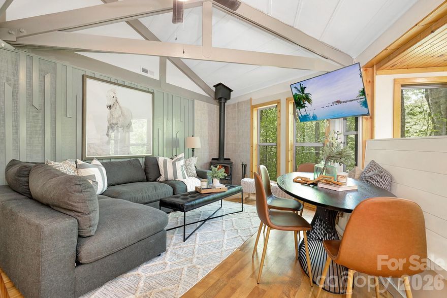 Priced to sell and offered fully furnished, this turnkey 3BR/2BA Beech Mountain cabin is a proven short-term rental performer, generating a combined $121,349 in rental income across 2024 and 2025 with excellent 4.9 star reviews on Airbnb! Guest love the privacy, the hot tub and deck area and the location which is very close to Beech Mountain ski resort and restaurants! Tucked among the trees on a quiet street, the property includes an additional lot next door with added privacy for a total of approximately .66 acres, complete with a picturesque creek running through the land, creating a peaceful and private mountain setting. 

Designed for both relaxation and entertainment, the home offers a true mountain getaway experience with amenities including a hot tub, fire pit, swing bench, arcade game, foosball table, bunk beds, and multiple TVs. The open-concept living area features a cozy wood-burning stove, while the fully equipped kitchen includes a gas range, stainless steel appliances, and everything needed for a seamless guest or owner experience.

Step outside to enjoy multiple deck areas surrounded by nature, perfect for morning coffee, evening gatherings, or simply unwinding in the fresh mountain air. The additional lot provides added privacy, potential, and a unique natural setting rarely found at this price point.

Located just a short drive from Beech Mountain Ski Resort, this property offers year-round appeal for both visitors and owners alike. Whether you’re looking for a high-performing investment, a second home, or a personal mountain retreat, this property delivers flexibility and strong income potential.

For added convenience, the current property manager is open to continuing management, offering a seamless transition for the next owner.

Don’t miss this rare opportunity to own a successful, fully turnkey mountain cabin in the High Country. Schedule your showing today!