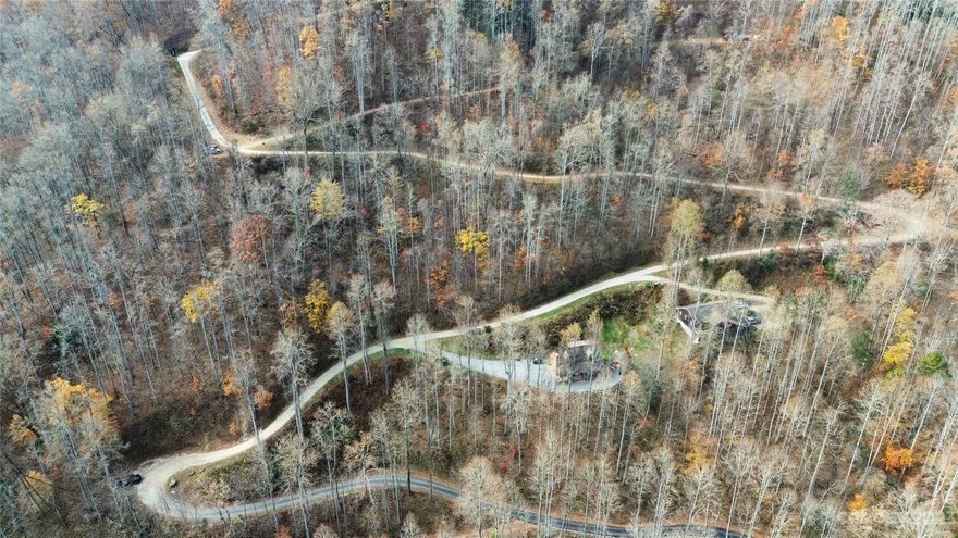 Ready to build your mountain cabin in Western NC? Look no further then this 3.28 acre lot in a great subdivision right outside of Sylva! Three bedroom septic installed, easy access, and the neighborhood is in the process of being paved.