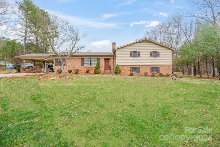 Beautiful 3 bedroom / 3 bathroom split-level off a beautiful country road in Maiden. This home is nestled off the road and sits on almost 2 acres. The property is incredible and the home is well-maintained and has so many unique features. Step inside to see a cozy breakfast nook with a built in desk and bookshelves, a spacious sunroom with a Fisher wood stove, and there is a formal dining room that could be converted into an office. Finished basement with 1 bathroom, a kitchen and fireplace with gas logs. Additionally, there is an inground pool. Per seller, the pool pump and tank are apx. 2 years old. There is also a 28x36 wired workshop behind the home with 2 garage doors. 
Come see what country living is all about!