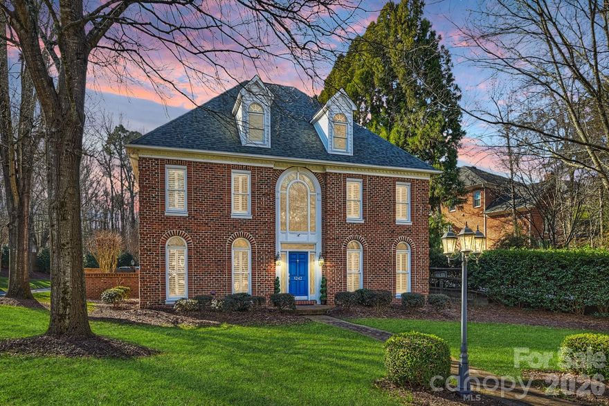 Privately gated within Amyington — an intimate 11-home cul-de-sac enclave in the heart of SouthPark — 5242 Colony Road delivers a rare combination of architectural character, courtyard-centered indoor-outdoor living, and low-maintenance luxury just minutes from Charlotte’s premier dining, shopping, and business corridor.

Designed around a stunning private courtyard that fills the home with natural light and connection, the residence offers expansive gathering spaces, seamless flow to outdoor entertaining areas, and a layout that lives effortlessly day to day while scaling beautifully for hosting. Large windows and timeless architectural details create warmth and character throughout.

The renovated kitchen opens naturally into the main living spaces, while the primary suite serves as a peaceful retreat with a spa-inspired bath and generous storage. Flexible secondary spaces provide ideal options for guests, office, fitness, or media needs without sacrificing comfort or functionality.

Extensive improvements have already been completed, including major system updates, drainage enhancements, exterior improvements, electric gates, refreshed finishes, and beautifully maintained grounds — creating a true move-in ready experience.

What separates this home is not simply its location, but the lifestyle it offers: privacy, architectural consistency, lock-and-leave convenience, and a quiet residential setting within one of SouthPark’s most discreet enclaves.