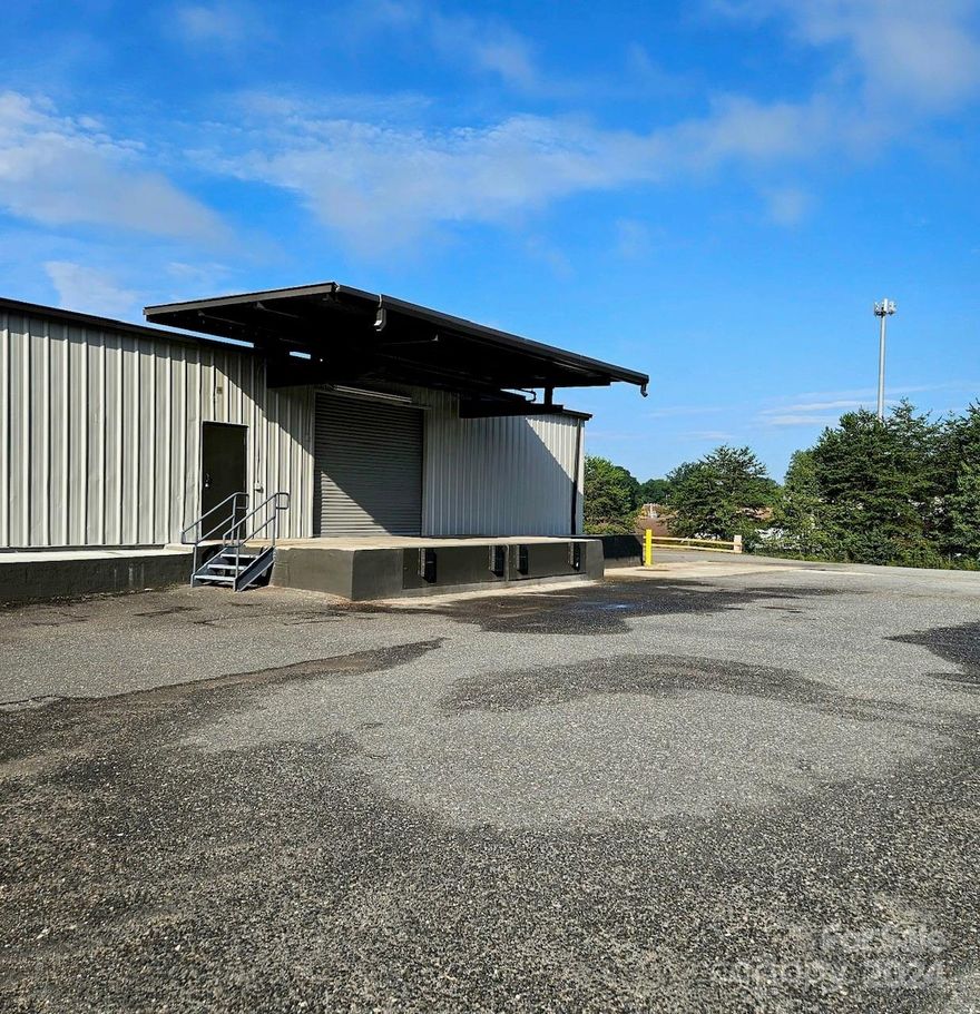 FOR SALE OR LEASE | 37,500 square foot manufacturing/warehouse available in Hudson, NC! This space has approximately 2,122 sf of office space, 5+ restrooms, and 11 dock doors: (1) 12x10, (3) 9x9, & (7) 8X8. With ceilings ranging from 10-14'7" (at beams) and concrete floors, this is a great opportunity! There is an additional 6,000 sf building available with the SALE of the property (total of 43,500 sf). Gas Unit heater in the warehouse, central HVAC in the office area, 120, 208, and 480v panels. (3) New 9x9 Dock Doors as of May 2024

$10,500/mo. for 37,500SF