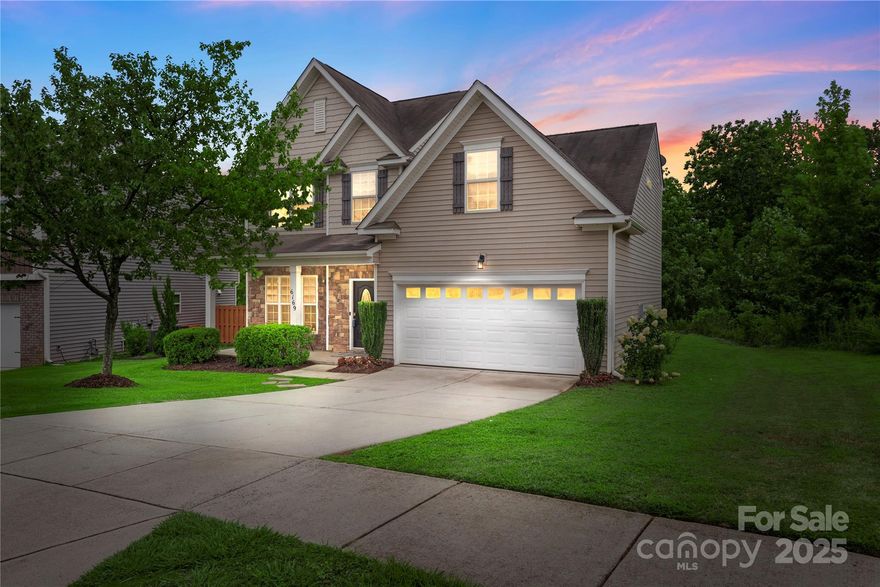 Welcome to this beautifully updated 3 bedroom and 2.5 bathrooms, in the desirable Almond Glen neighborhood! The main level features an open floor plan allowing natural light to shine on the fresh paint and durable vinyl plank flooring. The generously sized living room boasts large windows and a cozy gas fireplace, flows into a spacious dining area, breakfast area and a kitchen with quartz countertops, GE Café double oven range and microwave, abundant cabinetry, custom tile backsplash, stainless steel appliances, and a dedicated pantry. The upper level, with brand new carpet, provides tons of usable space starting with the large primary suite that includes a luxurious soaker tub, separate shower, and dual vanities. The secondary bedroom and large loft provide a clean slate for all your needs. Enjoy your rear patio on the semi-private end lot! Community amenities include a clubhouse and pool—perfect for a vibrant lifestyle!