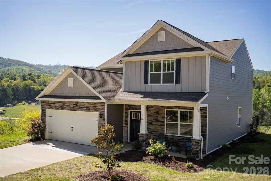 Designed for both style and function, this inviting, near-2600 SF, 2022-build boasts a Primary BR & BA on the MAIN & another upstairs! Views from almost every window! Spacious 4BR 3.5 BA + versatile "loft" offer great indoor comfort. Tons of walk-in closets/storage, attached 2-car garage, and it's at the top of the small subdivision with year-round mountain and sunset views! Features to boast of include stainless steel Whirlpool appliances, granite counters, a large kitchen island-breakfast bar, just perfect for casual dining! If you care for more formality, have a meal in the separate DR. Enjoy natural gas for cooking and the fireplace. Outdoors is ideal at this around-the-bend "corner" lot with a fenced area for pets or play. Relax on the front porch after a long day or gather some friends and entertain on the back patio over the weekend. This home checks all the boxes for location and lifestyle! Less than 2 miles to: Lake Louise and its trail, picnic spots, playground, fishing dock, and pickleball. Same distance to quaint Weaverville's Main St w/ eateries, shops, art galleries, breweries, and nature park. And it's a swing away from Reems Creek Golf Club. Blue Ridge Pkwy (MP 375.7) and lively DT AVL, plus the River Arts District, are all a quick 15-20 min! What's not to love! Come see for yourself, and you may never leave. Would love to see your offer!