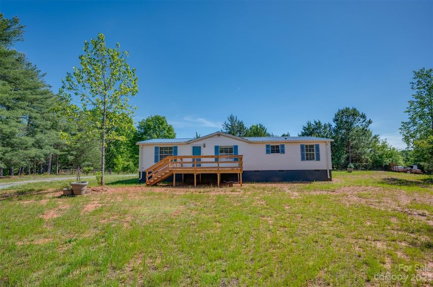 Two for one! Updated Doublewide on 2 acres comes acres with a tenant-occupied singlewide and workshop.The split floor plan boasts stainless kitchen appliances, laminate and tile flooring throughout. Pimary bedroom has large bathroom with walk in shower and 2 walk in closets. The large living room w/dining area just off kitchen. The back deck leads to the carport and the covered shelter perfect for entertaining! Conveniently located to Hwy 221, Forest City, Rutherfordton and Chesnee SC. Use both as income producing property or leave the tenant in the singlewide and you live in the doublewide.