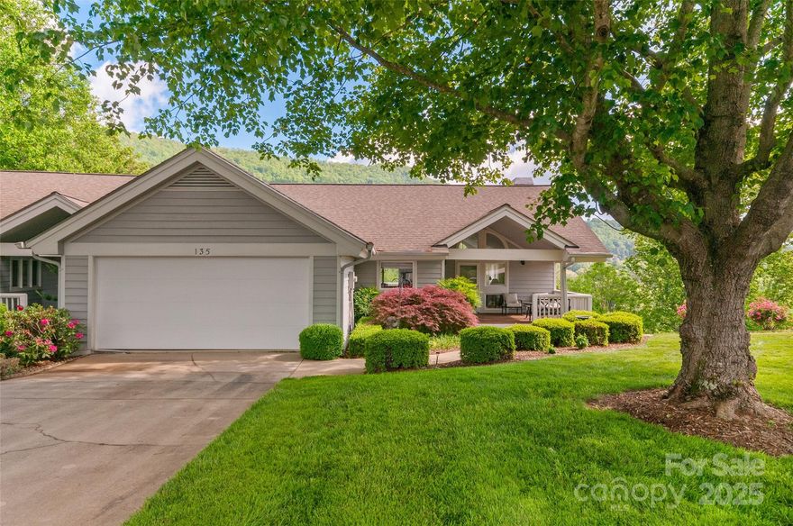 Location Location Location! Laurel Ridge Country Club Townhome located in the popular Overlook Subdivision!Boasting Beautiful Mountain views and views of Downtown Waynesville, and Laurel Ridge Golf Course! The home boasts vaulted 10 X 15 covered front porch, Spacious upper and lower back porches, vaulted great room with wall of windows to enjoy the amazing views from, floor to ceiling stone gas log fireplace, Hardwood flooring, a beautiful dining area, an open and spacious kitchen and finally a main floor bedroom suite with gorgeous remodeled double vanity bath with unbelievable tile shower! Lower level features new LVP floors, charming 2nd bedroom, and spacious bedroom suite!  Main level 2-Car garage, beautiful landscaping complete this rare find home!