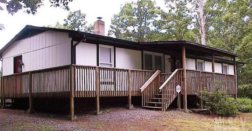 Immaculate 3 bedroom 2 bath home. Many updates and features.New wrap around decking and screened back porch for evening meals,entertaining, or relaxing.New flooring in Kitchen,1 bedroom,living room and family room. New heat pump 2-3 , water heater 2-3 years.located 8 miles to South mountain state park, and only a few miles to George Hildebran Elementary. This home offers lots of room inside and out. Storage building stays with home.