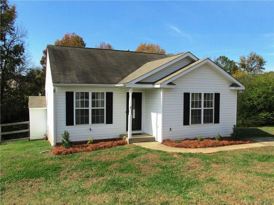 Well maintained move in ready ranch! Split Floor plan with laminate wood floors in great room and hall, fresh paint in bedrooms. Large kitchen with island and tile back splash. Breakfast area has sliding glass door that opens to large deck overlooking fenced backyard. Storage building in back. Nice sized bedrooms and closets.