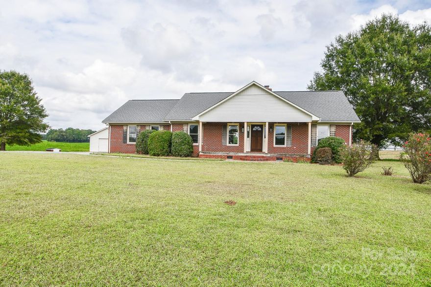 Sitting on a 1-acre lot, this ranch-style residence features three bedrooms, two bathrooms, a kitchen with a cozy breakfast nook, and a separate dining area. The expansive living room boasts a gas fireplace, while you’re welcomed by a charming rocking chair front porch and a private deck with distant neighbors. Ample parking is available, along with both an attached and a detached garage. Experience the beauty of the countryside by scheduling a tour of this lovely home today!