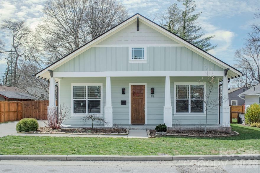This immaculately appointed modern bungalow offers a rare opportunity for refined, one-level living in the heart of downtown Brevard. Showcasing high-end finishes, 10-foot ceilings, and meticulous attention to detail throughout, this home blends comfort, style, and convenience in an exceptional in-town setting.

A short stroll along charming sidewalks leads to Brevard’s vibrant downtown, where you’ll enjoy fine dining, live music, shopping, bakeries, art galleries, and coffee shops. Brevard Elementary School, historic Silvermont Mansion, Brevard College, and Franklin Park—with its pool and playground—are all nearby. Outdoor enthusiasts will appreciate the easy access to Pisgah National Forest, DuPont State Forest, and Bracken Preserve, as well as convenient proximity to Asheville Regional Airport.

Inside, the open living, dining, and kitchen area is designed for both easy everyday living and effortless entertaining. The airy living room is filled with natural light and features a gas fireplace framed by custom built-in bookcases and mantel.

The gourmet kitchen centers around a generous granite island and includes a gas 5-burner range, glass-and-steel exhaust hood, custom cabinetry, stainless appliances, and upgraded fixtures. Polished, beveled subway tile backsplashes add depth and sophistication to both the sink and cooktop areas.

The spacious primary suite offers a peaceful retreat, complete with a large walk-in closet and direct access to a private patio. The en suite bath features a double granite vanity and a glass-enclosed, floor-to-ceiling tiled walk-in shower. Two additional bedrooms provide ample closet space and share a beautifully finished guest bath with tile and granite details.

Outside, a welcoming front porch overlooks a tidy yard and convenient two-car parking area. The fenced and gated backyard is a private oasis, featuring flagstone and gravel patio spaces, boulder accents, and thoughtfully designed landscaping with flowering shrubs, berry bushes, and native perennials. Raised garden beds provide an excellent opportunity for growing your own herbs, vegetables, or flowers, adding to the home’s charm and functionality.

This turnkey home offers the ideal combination of upscale finishes, walkable downtown living, and close proximity to some of Western North Carolina’s most beloved outdoor destinations—an exceptional opportunity in Brevard.

3-D Walk-Through Tour Here: https://my.matterport.com/show/?m=AtTftXuRGkc