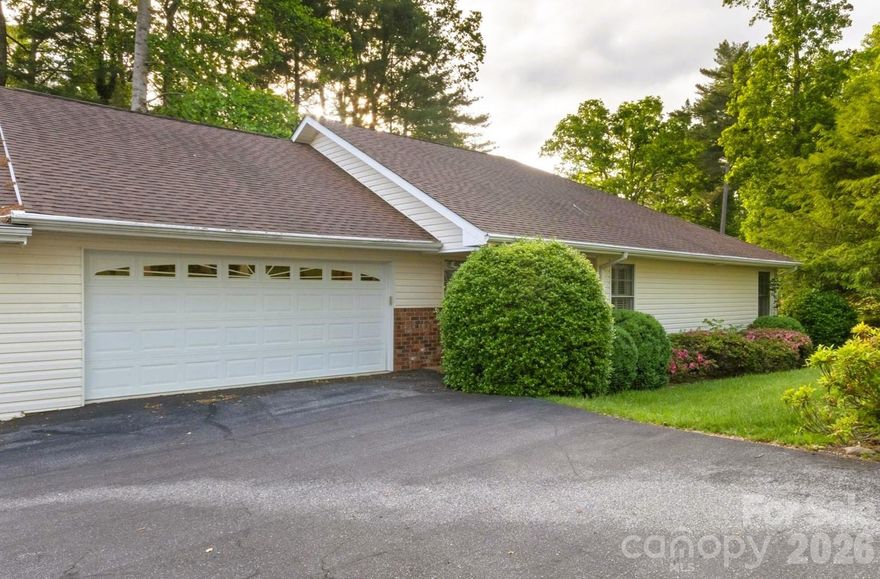 Enjoy easy one-level living just minutes from downtown Hendersonville in this inviting home located in a pet-friendly community close to dining, shopping, parks, and medical services. Vaulted ceilings and skylights fill the home with natural light, while the flexible layout includes a den or office, large bedrooms, and a spacious primary suite with a walk-in closet. Relax year-round in the three-season room overlooking the back deck. Additional features include a laundry room, attached two-car garage, and extra storage or workshop space off the garage. The HOA maintains the yard, helping simplify daily life so you can spend more time enjoying everything Hendersonville has to offer. Schedule your showing today!