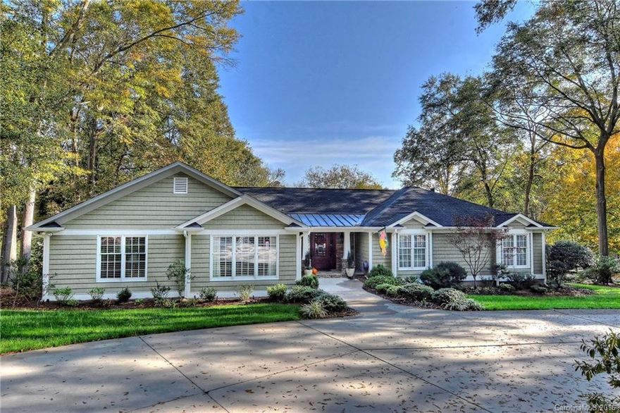 Spectacular 5BR, 4BA ranch/bsmt. on an over 1/2 acre corner lot. Awesome open floor plan, gleaming hardwood floors, custom built-ins, gorgeous designer kitchen & luxury master suite! The finished lower level offers plenty of flexibility & includes a large family room w/fireplace, bedroom, bath, office & 2nd laundry room. Huge deck & covered lower patio overlook the pool & spa w/extensive concrete decking. Oversized rear load garage & circular driveway. Tankless water heater, new upper HVAC 2015!