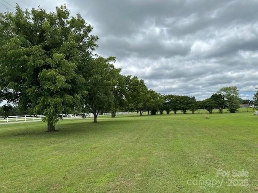 Beautiful 3.04 acre lot. The lot is established with electricity, working well and septic system for 3 bedroom dwelling. Situated on the land are two buildings 8x8x9 and 16x24x9. Located on the land are many fruit tree’s which include apple , pear, peach, pecan & black walnut.