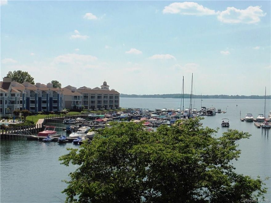 Beautiful Waterfront penthouse 2 br & 2 ba condo w/unbelievable sunset views!  Open floor plan; perfect for entertaining. Open kit w/brkfst bar and tile flooring,  Great room w/cozy fpl & vaulted ceiling. Enjoy beautiful sunset views from huge deck that overlooks pool, marina and lake.  Neutral decor and move in ready!  Paddle boarding, fishing, tennis, and boating right out your door. Lake living is like being on vacation year round.  Great location close to I-77 and walk able to Birkdale.