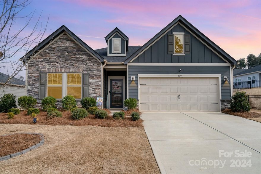 Welcome to your ideal home at The Vineyards on Lake Wylie, where a perfect blend of comfort and convenience awaits. This charming residence features 3 bedrooms and 2 bathrooms, offering an inviting space for you and your family. The open floor plan seamlessly connects the living, dining, and kitchen areas, creating a warm atmosphere for gatherings. Modern living is embraced with state-of-the-art spray foam insulation, ensuring energy efficiency throughout the year. Step outside onto the roughly 500sqft extended patio, complete with a covered porch, providing an ideal space for al fresco dining or simply unwinding. The nearly third-of-an-acre fenced yard adds an extra layer of privacy, creating a perfect oasis for outdoor activities and relaxation. Located just 5 minutes from the airport and a quick 15-minute drive from uptown, this home offers a unique blend of suburban tranquility and urban accessibility. Come enjoy The Vineyards and all it has to offer!