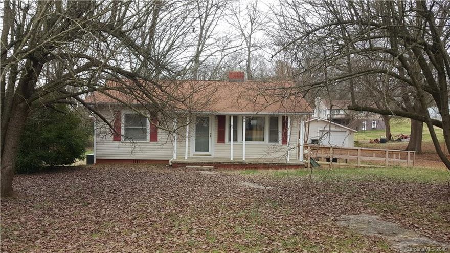 Charming 2 BR/ 1 BA home.  Large kitchen with sunny breakfast area.  Lots of cabinets.  Detached 1 car garage w/ large storage area and a 1 car carport.