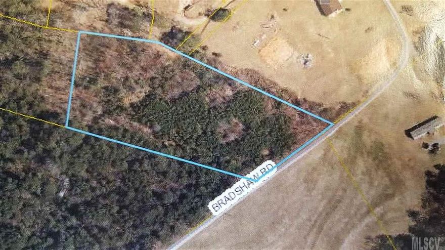 Rural area and tract is wooded, medium topography.  Bradshaw Rd ends at house beyond tract.  Large cleared field across from tract.  Plat available and indicates 200 ft road frontage.  Good tract for house, modular, or doublewide.