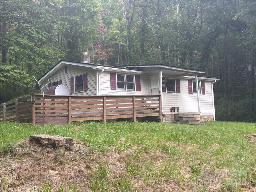 Rare Opportunity – 8.47± UNRESTRICTED Acres Near Downtown Waynesville

Don’t miss this exceptional chance to own nearly 8.5 acres of unrestricted land just minutes from downtown Waynesville. Whether you're envisioning a private estate, family compound, or small development, this property offers incredible versatility and potential.

Outstanding Views – Multiple potential homesites with long-range mountain views.
City Water Access – A valuable utility feature that expands your building options.
Renovation Opportunity – The existing home has strong bones and is ready for your vision. Finish the renovation and enjoy instant equity.

With its proximity to town, natural beauty, and development potential, this is a truly rare find in a highly desirable area. Act fast—opportunities like this don’t come around often.