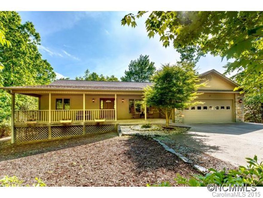 IMMACULATE light & bright home with soaring ceilings, skylights, fireplace & spacious rooms. 3 beds, 2 baths and huge bonus room offers many options for guests. Enjoy great outdoor living spaces such as a huge covered front porch, screened dining porch & private open deck. The .99 acre lot is level, low maintenance & borders the golf course. Two car garage, hot tub, Anderson windows, central vac, & more. $8,000 to enjoy all Connestee amenities!