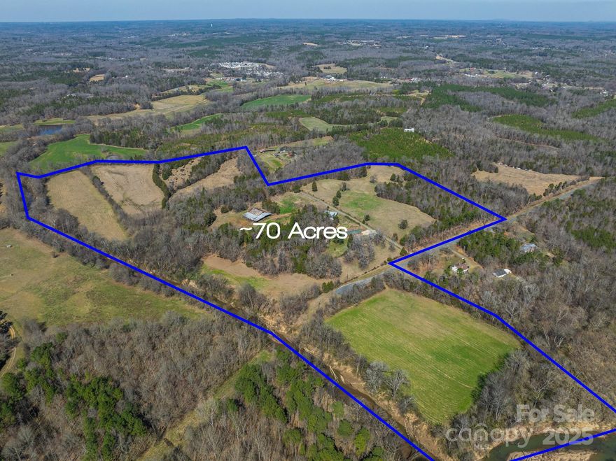 Discover a rare opportunity build an exclusive private estate or to shape a premier residential community in one of Concord’s most sought-after and fast-growing areas. This expansive ±70 acre property offers the perfect balance of seclusion, natural beauty, and accessibility. Tucked away in a peaceful, wooded setting, the land features scenic frontage along the Rocky River & Cold Water Creek, providing a serene and picturesque backdrop, ideal for a thoughtfully planned neighborhood. Despite its quiet atmosphere, the property offers easy access to Highway 601, placing future residents just minutes from schools, shopping, dining, and major commuter routes. With gently rolling terrain, mature trees and riverfront vistas, the possibilities are endless. Whether you're envisioning a luxury gated enclave, estate-style homes, or a master-planned community that embraces and enhances the natural landscape, this is a blank canvas for your vision. Additional parcels available for a total of ±278 acres. Access is only available via a scheduled and approved showing.