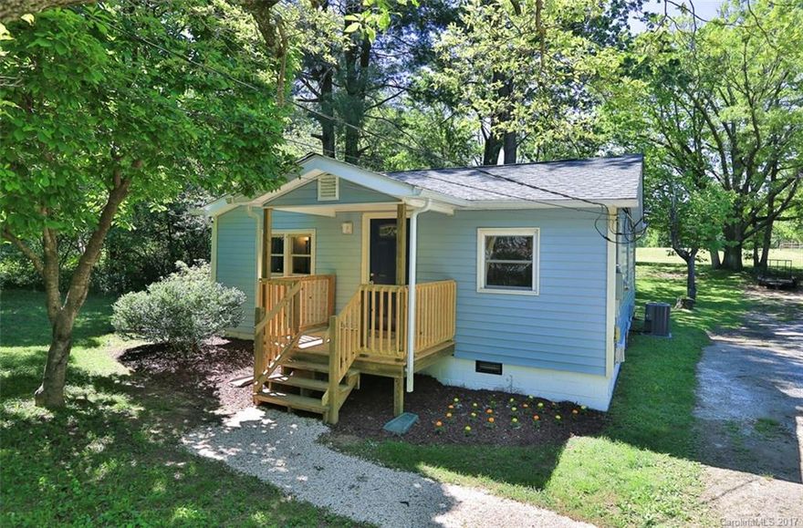 "HOME! SWEET HOME!"Affordable & Adorable One-Story Home!2 Bedroom/1Bath on 1/3 Acre PRIVATE,LEVEL lot.  Just the perfect home to own! Also a  Wonderful Investment Opportunity!Upkeep is a Breeze~NEWER Roof and Heating&Cooling- Roof,Heat Pump &Central Air installed in 2014. Other 2014 renovations include:Newer Paint, Carpet & Oven range/hood.NEW Front Porch.Convenient Location~Approx 1 Mile from I-26.Peaceful & Dreamy Setting w/Low Maintenance Private Flat Yard,Gorgeous Shade Trees & Meadow Views.