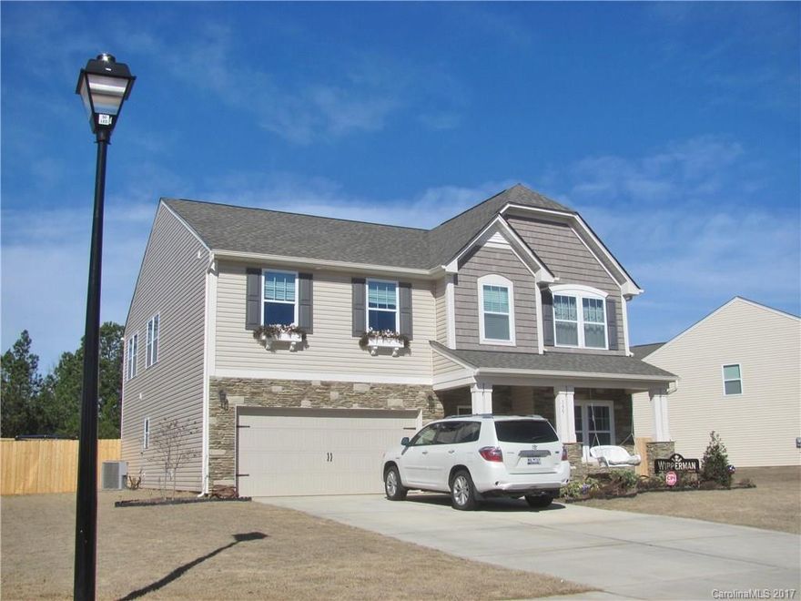 Better than new. Immaculate designer grade home, 4 bd/2.5 ba, spacious premium lot with privacy fencing in rear yard. Open floor plan, family area up and downstairs, over 3100 sq ft heated space. This one is a gem ~ call today.