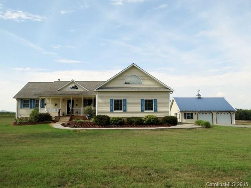 This amazing home is located in the heart of wine country on a quiet private drive with a great view of the foothills. This home offers an open floorplan with an amazing fireplace in the living room complete with gas logs and a mantel made with timbers from the old RJ Reynolds building. There are 2 additional bedrooms in the basement and 1020 additional sq feet that just needs the ceiling finished to be included in your finished living area. So many possibilities here!