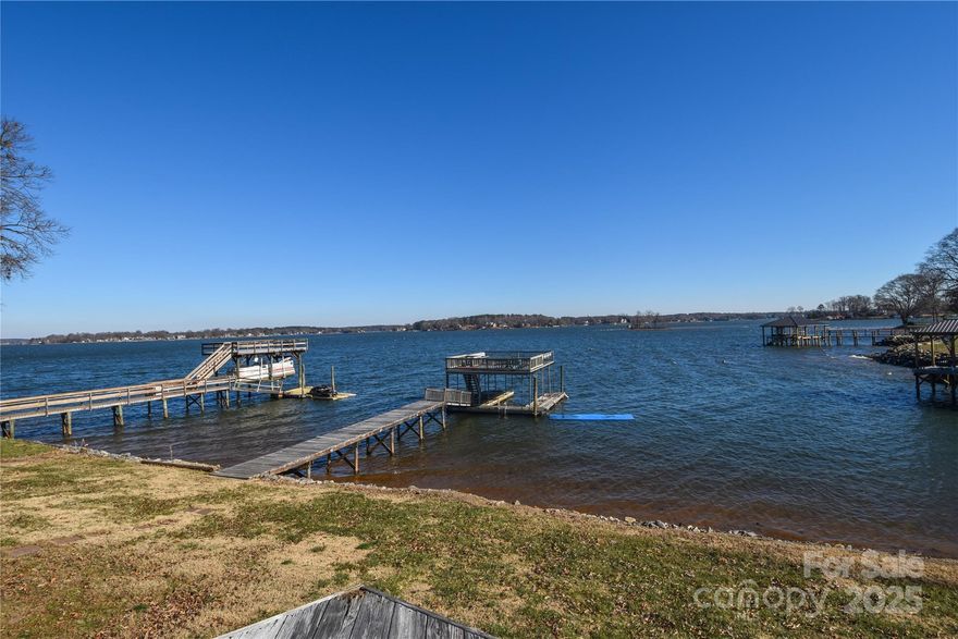 Come see this charming waterfront home with outstanding views of Lake Norman!  This is a hard to find location with great potential!